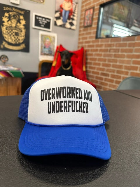 "Overworked and under fucked" snap back hat